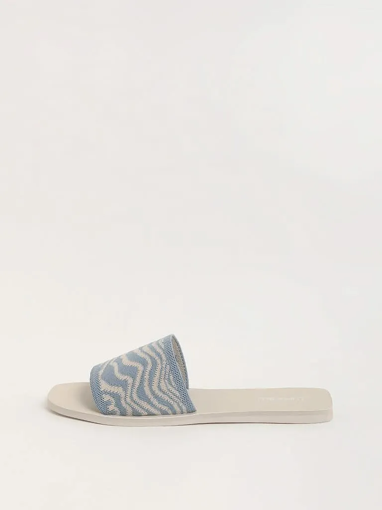 LUNA BLU Light Blue Zebra-Striped Slides