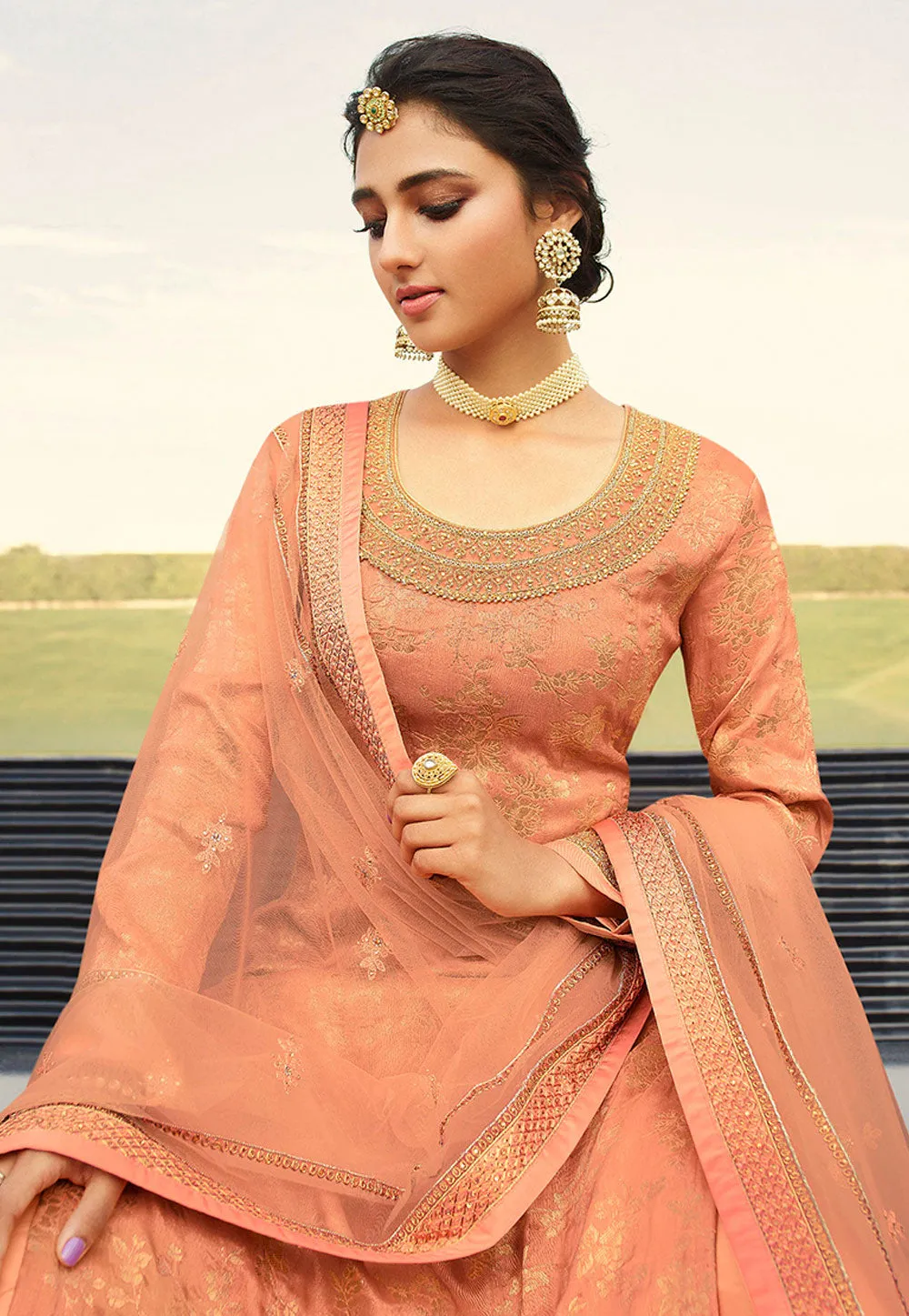 Pastel Orange Embroidered Gharara Style Suit